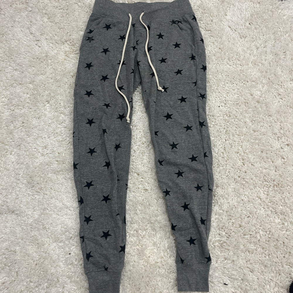 Grey Sweatpants With Black Star Design